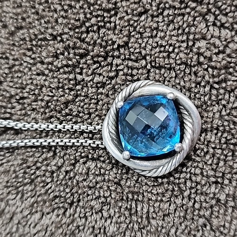 David Yurman Infinity medium pendant necklace with Hampton blue topaz.